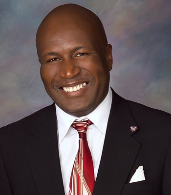 Portrait of Dennis Carter, Realtor®.